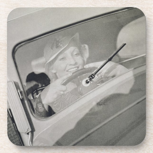 A woman driving, c.1930s (photogravure) coaster (Front)