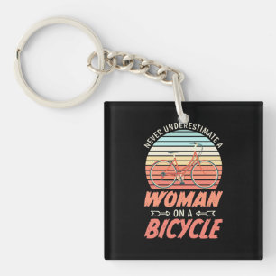 A Woman On A Bicycle Key Ring