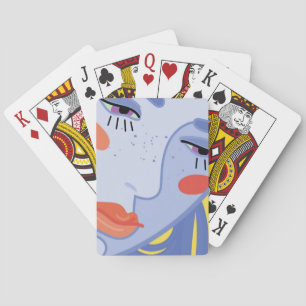 a woman's face with a bright lipstick. playing cards