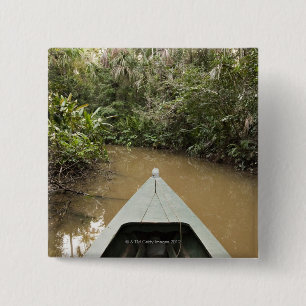 A wooden canoe made of Eucylptus tree floats in 2 15 Cm Square Badge