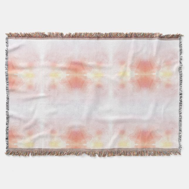 A woven throw blanket features a delicate gradient (Front)