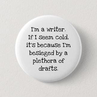 A writer's button pin.