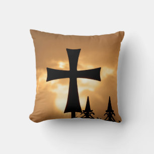 A Wrought-iron Cross on a Fence Cushion