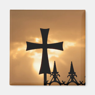 A Wrought-iron Cross on a Fence Magnet