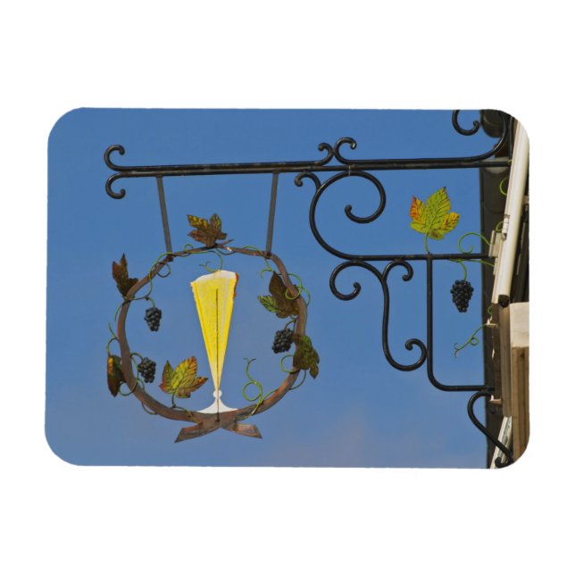 A wrought iron sign that illustrates the theme magnet (Horizontal)