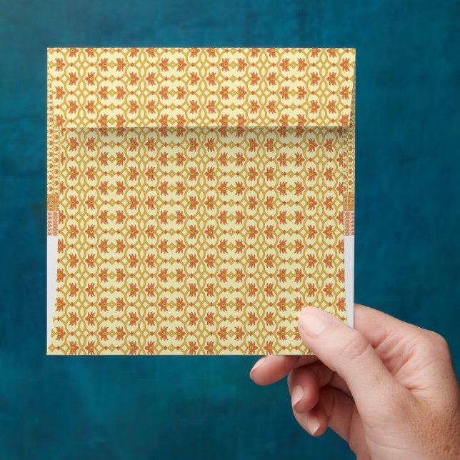 a yellow and white background with an intricate de envelope (Hand)