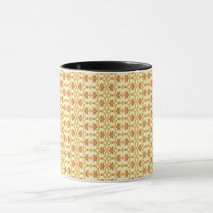 a yellow and white background with an intricate de mug