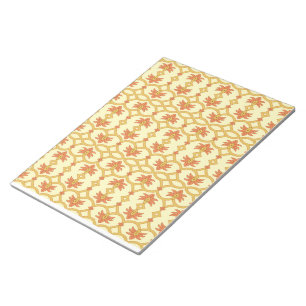 a yellow and white background with an intricate de notepad