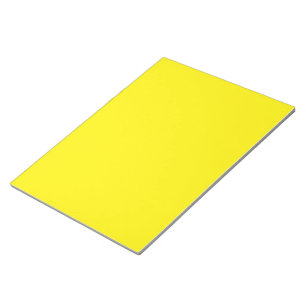 a yellow background with a black border notepad