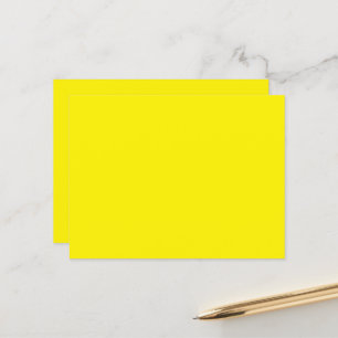 a yellow background with a black border postcard