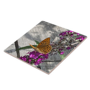 A yellow butterfly ceramic tile