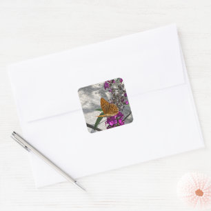 A yellow butterfly square sticker