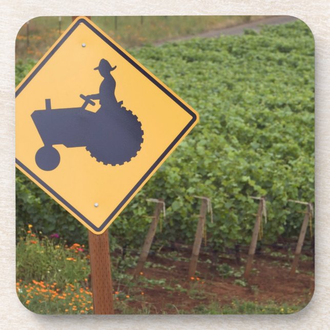 A yellow tractor crossing sign in the vineyard coaster (Front)