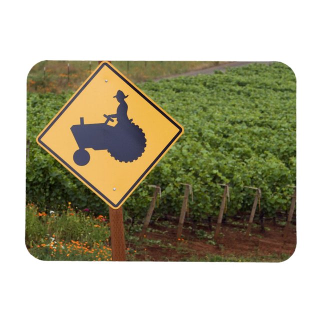 A yellow tractor crossing sign in the vineyard magnet (Horizontal)
