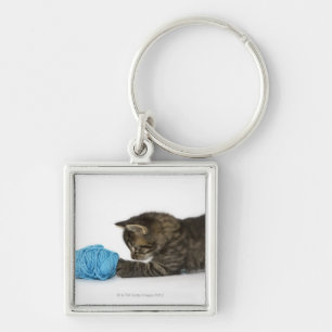 A young Tabby kitten playing with wool. Key Ring