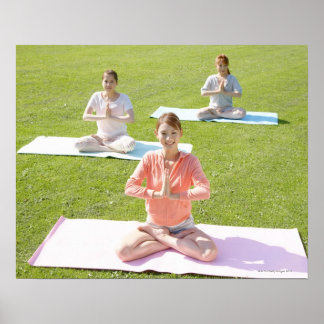 A young woman doing yoga poster