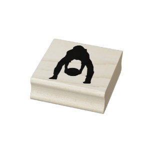A youth soccer player in silhouette rubber stamp