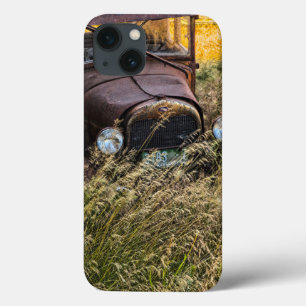 Abandoned old car in tall grass iPhone 13 case