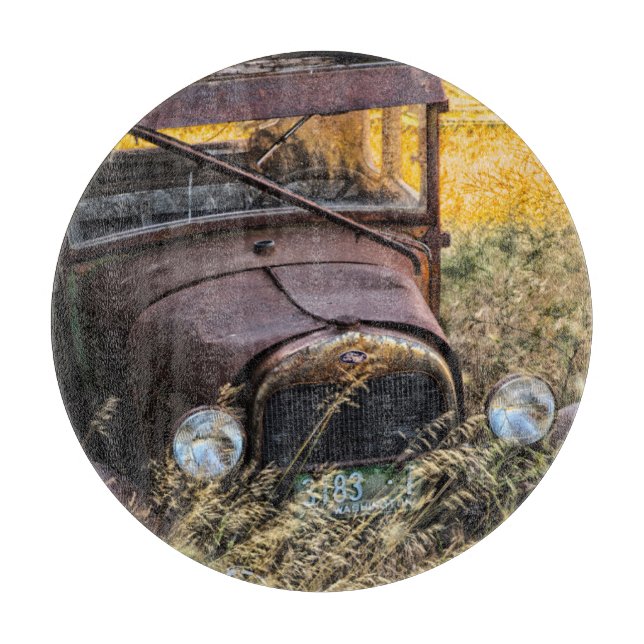 Abandoned old car in tall grass cutting board (Front)
