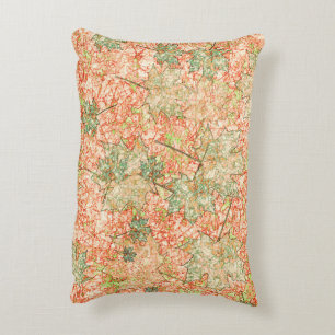 Abstract acer leaves upon scratched coral ground decorative cushion