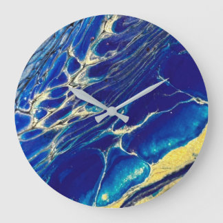 Abstract blue and gold ripple clock