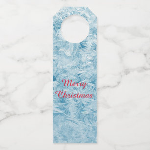 abstract blue feathers and snowflakes bottle tag