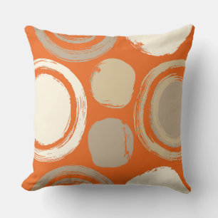 Abstract Circular Patterns on an Orange Background Cushion