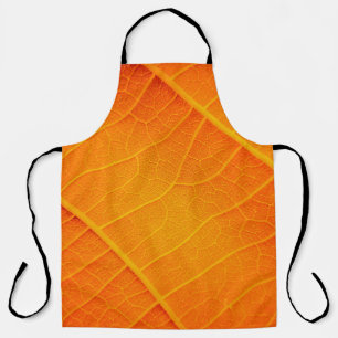 Abstract closeup of an orange and yellow leaf text apron