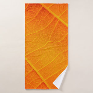 Abstract closeup of an orange and yellow leaf text bath towel