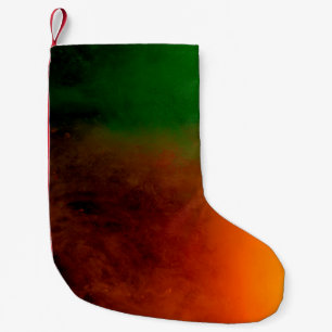 abstract coloured dust explosion on a black backgr small christmas stocking
