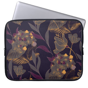 Abstract drawing of flowers and leaves on a golden laptop sleeve