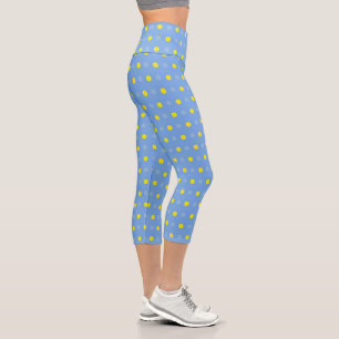 Abstract Floral of Yellow Gerberas on Baby Blue Capri Leggings