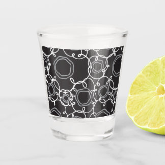 ABSTRACT FLORAL PATTERN IN BLACK SHOT GLASS