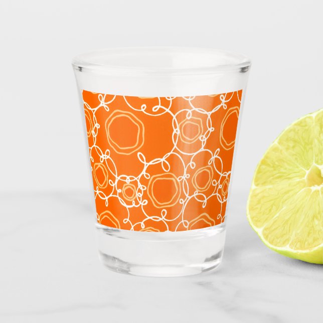 ABSTRACT FLORAL PATTERN IN ORANGE SHOT GLASS (Front)