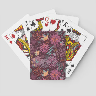 Abstract floral pattern with birds playing cards