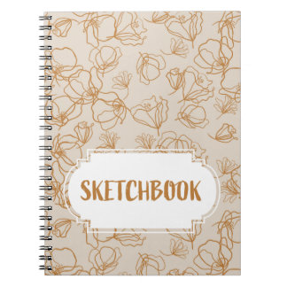 Abstract flowers over beige  notebook
