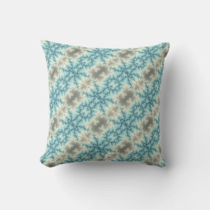 Abstract geometric blue and grey snowflake pattern cushion