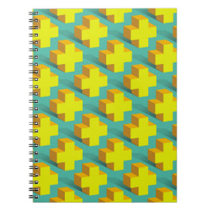 Abstract geometric texture of yellow crosses on a notebook