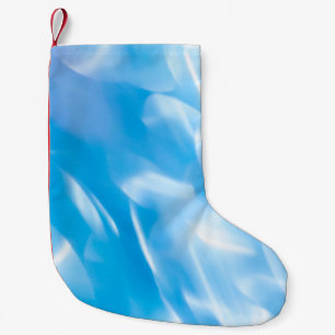 Abstract glitter lights on blue background. Round Small Christmas Stocking