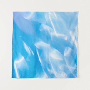 Abstract glitter lights on blue background. Round Tapestry