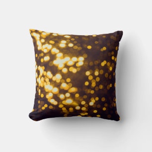 Abstract gold bokeh with black background cushion
