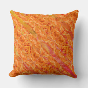 Abstract golden tamarin with crossed legs, orange cushion