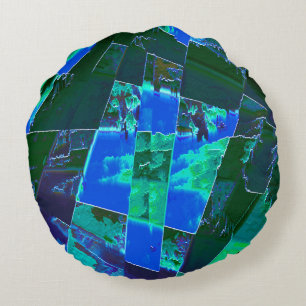 Abstract green pasture parts and blue sky, notched round cushion