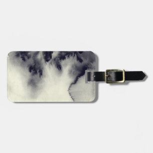 Abstract ink painting on grunge paper texture. luggage tag