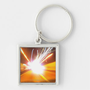 Abstract light beams and effects key ring