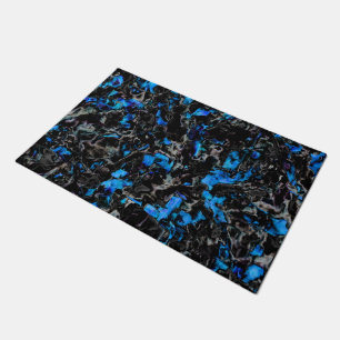 Abstract looking bat wings over stained turquoise doormat