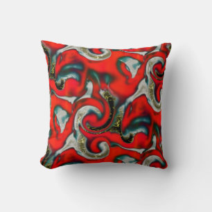 Abstract mix of red gradient stain over sandy grey cushion