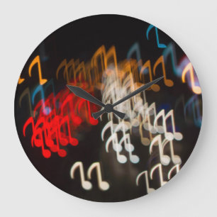 Abstract music notes: lights bokeh background large clock