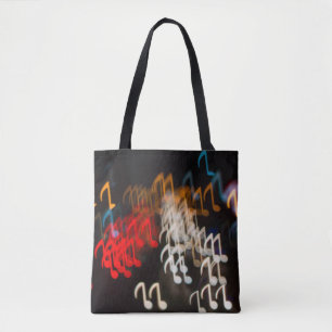 Abstract music notes: lights bokeh background tote bag