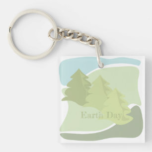 Abstract natural landscape with fir trees and sky key ring
